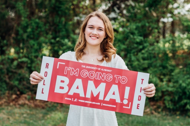 High School Senior posing with Alabama sign